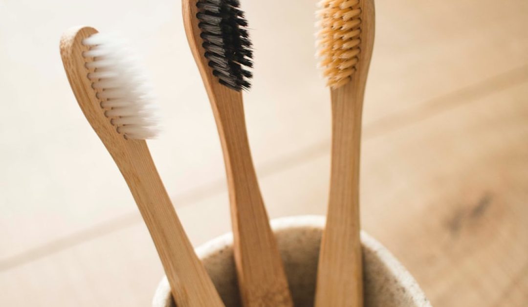 brown wooden sticks in gray ceramic bowl